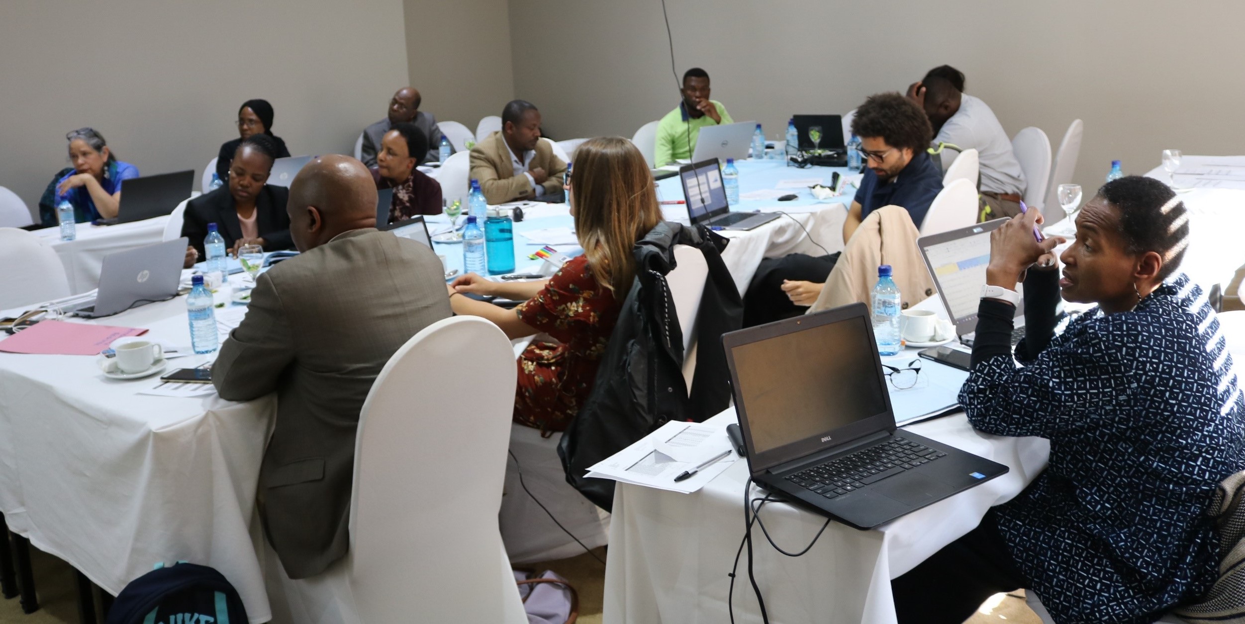 Image of participants in a GHSC-PSM led ARV forecasting and supply planning exercise in Botswana.